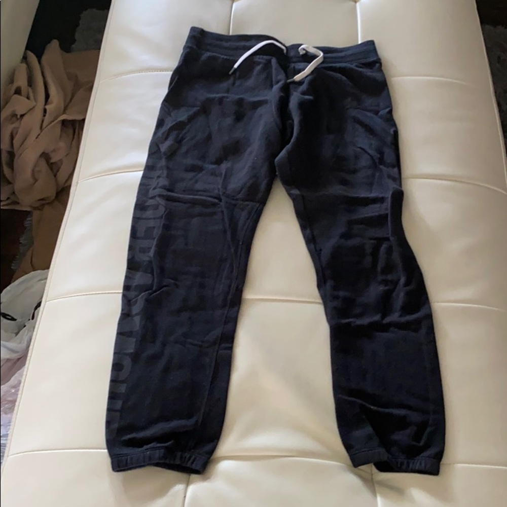 Black Under Armour sweats with loose ankle cuffs